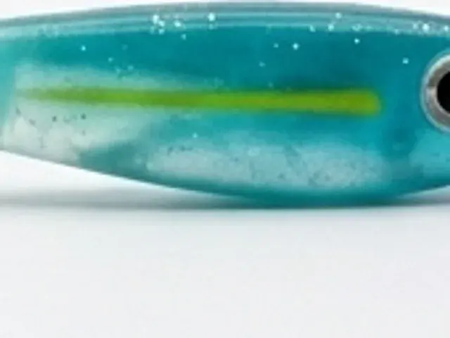 Gros plan sur les paillettes du corps, coloris Bleu.